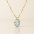 Oval Aquamarine Bezel Pendant Yellow Gold