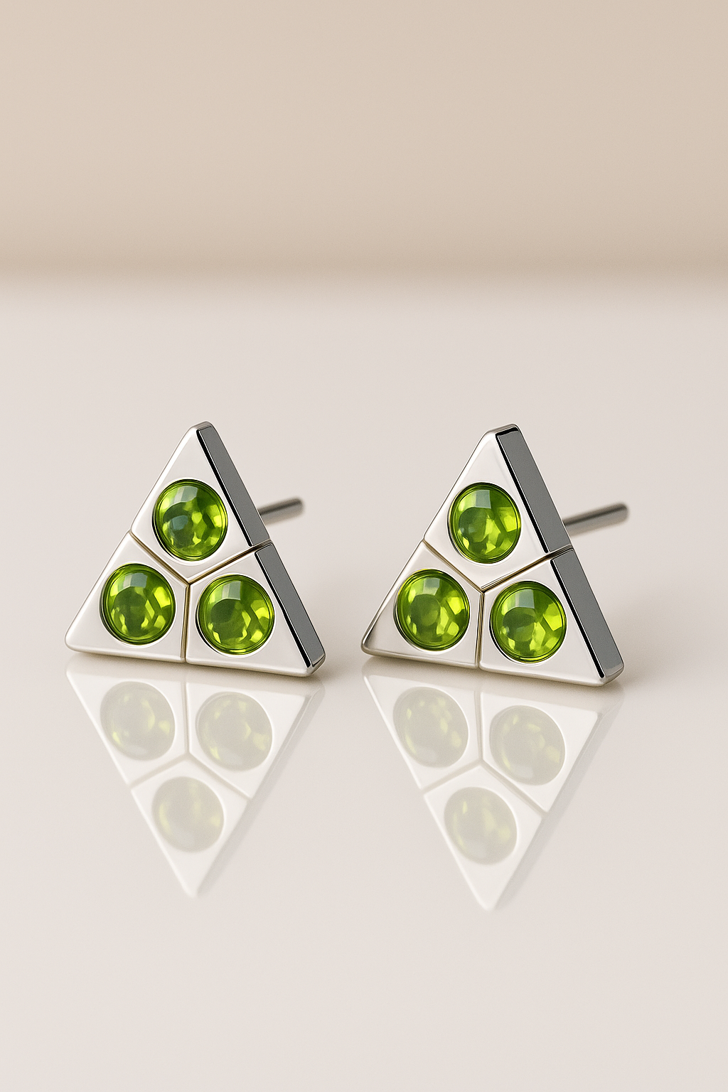 Dainty peridot triangle studs
