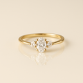 Oval Trio Diamond Ring –