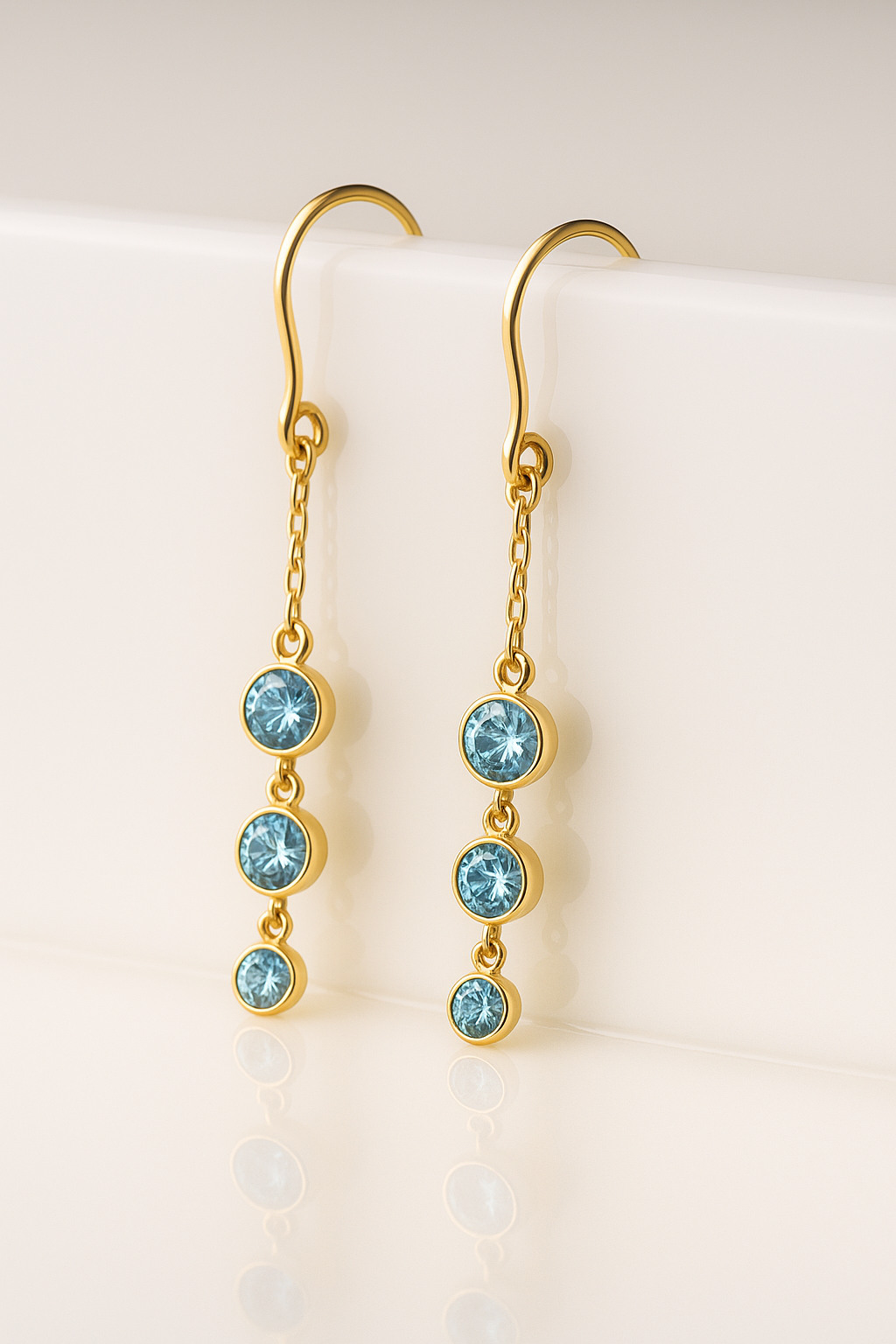 Delicate aquamarine station drops