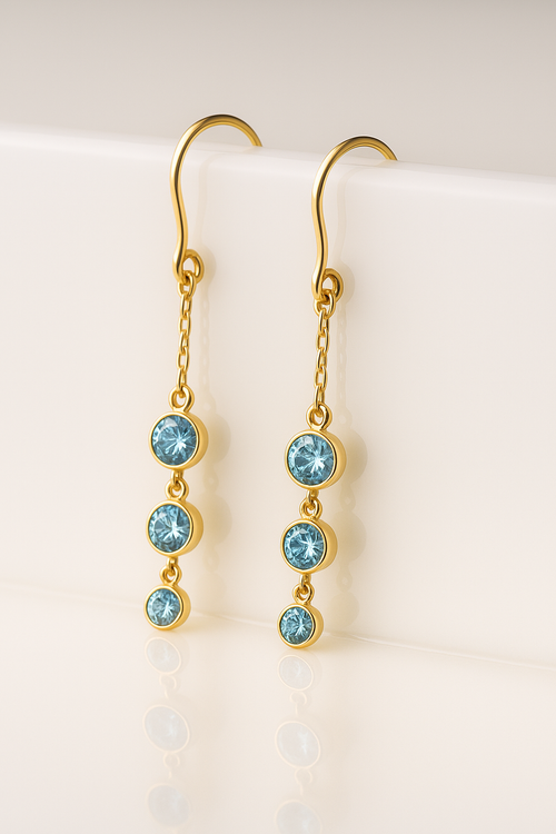 Delicate aquamarine station drops